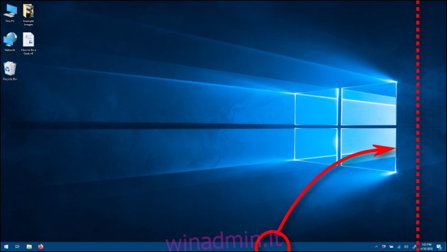 Spostare la barra delle applicazioni in un orientamento verticale trascinandola in Windows 10